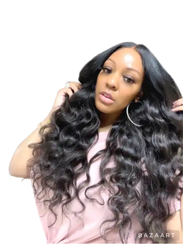 Long, flowing black hair with loose wavy curls styled in a glamorous manner.