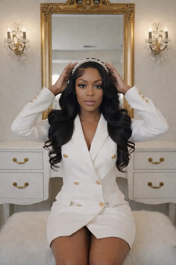 White double-breasted blazer with gold buttons and a tailored fit